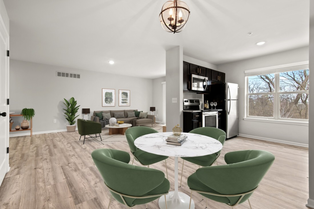 Updated Kitchen, with granite counter-tops, black cabinets, and new appliances